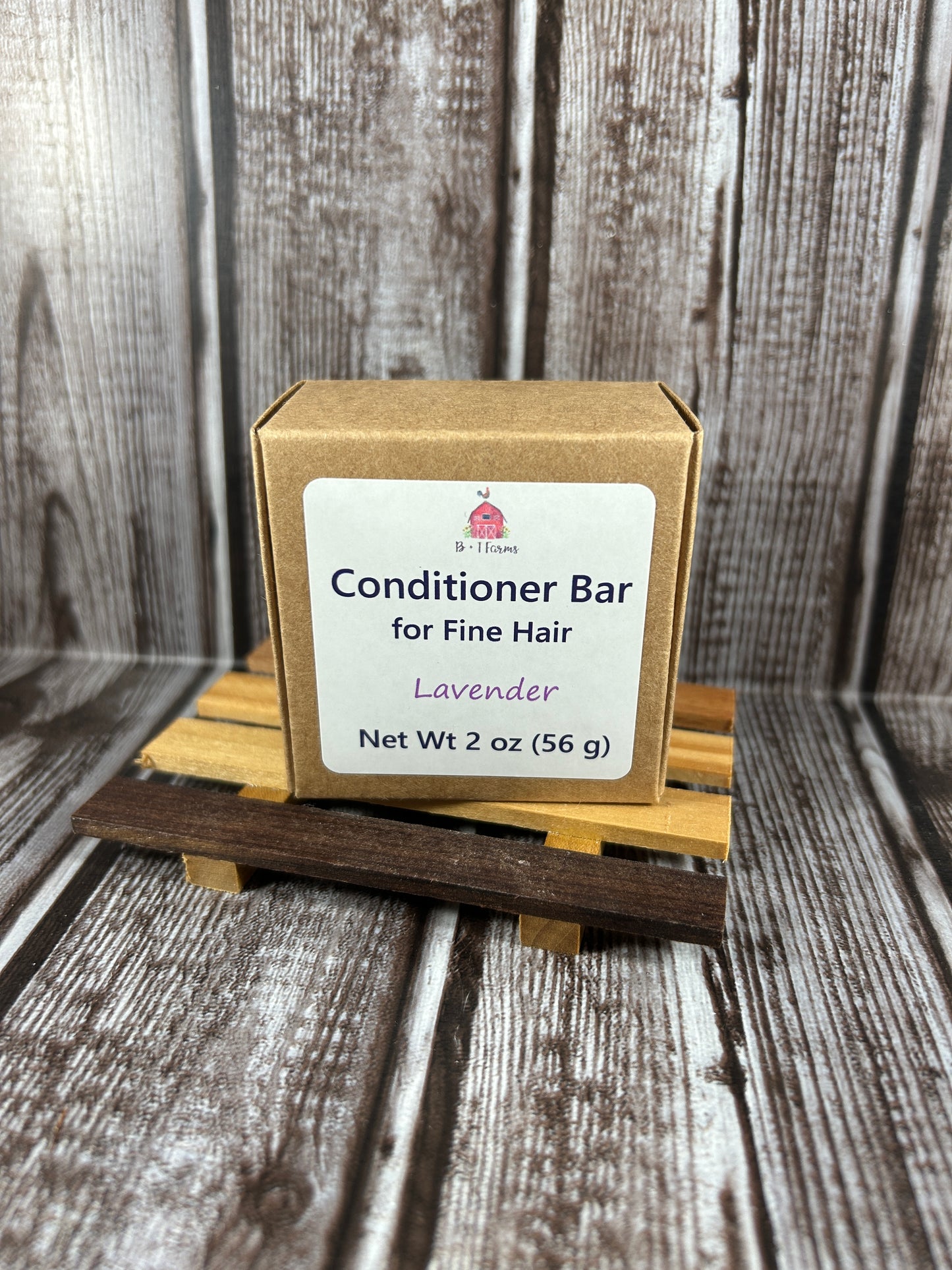 Conditioner bar with packaging on a wooden background