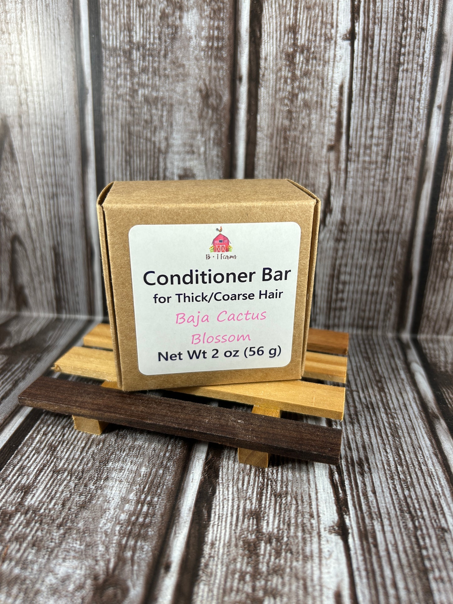 Conditioner bar with packaging on a wooden background