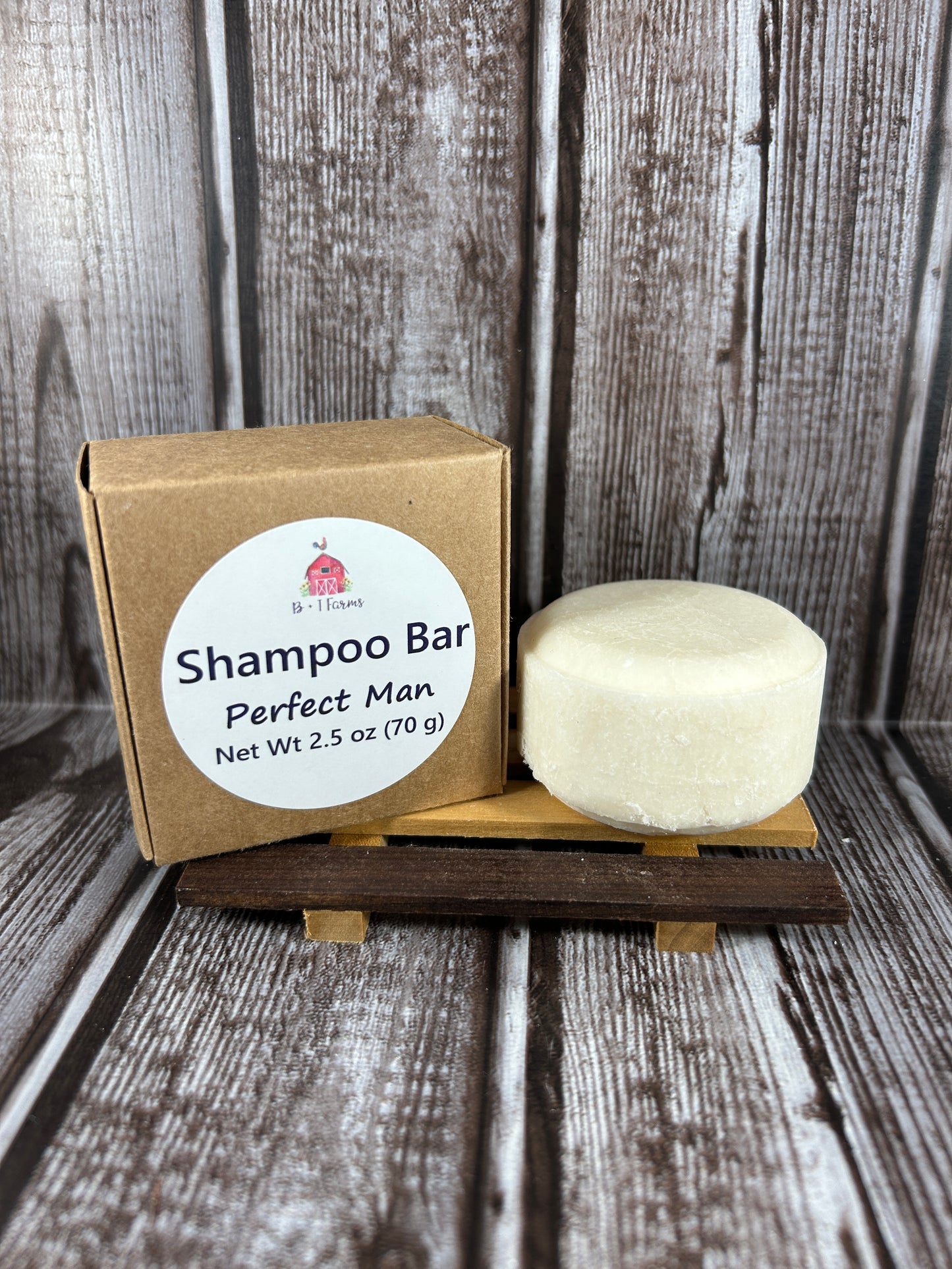 Shampoo bar on top of its packaging box with a label on a wooden surface