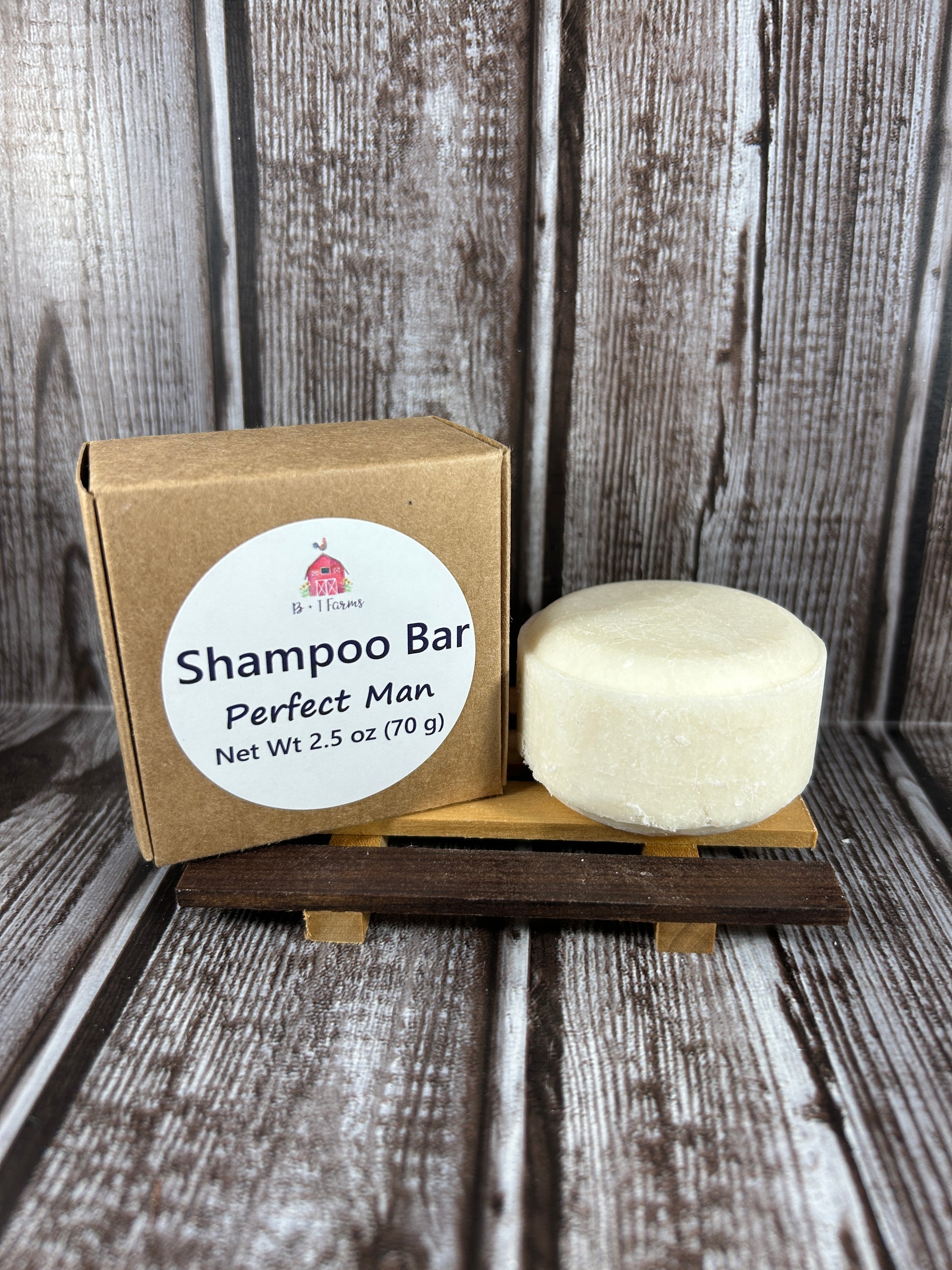 Shampoo bar on top of its packaging box with a label on a wooden surface