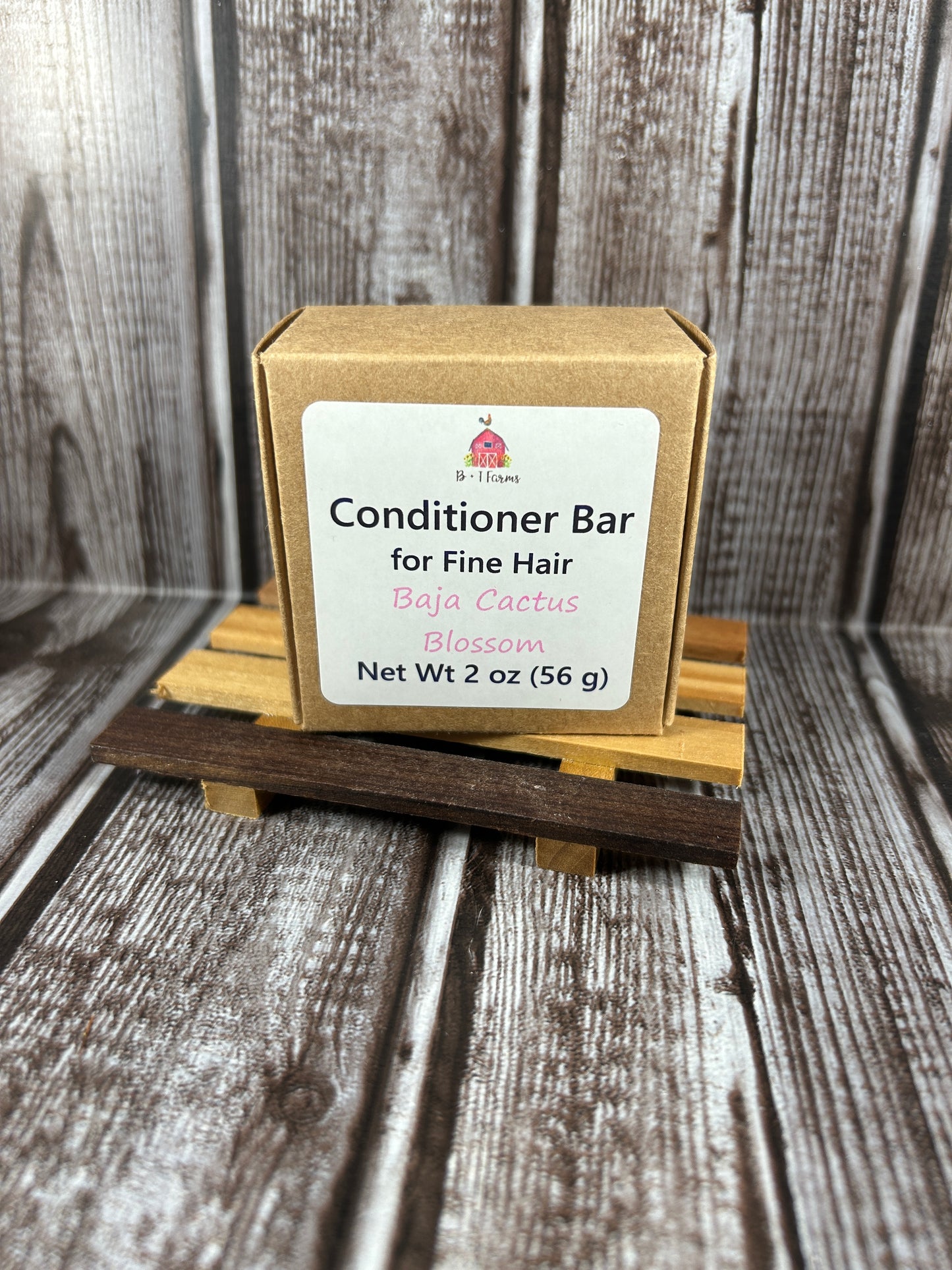 Conditioner bar packaging on a wooden background