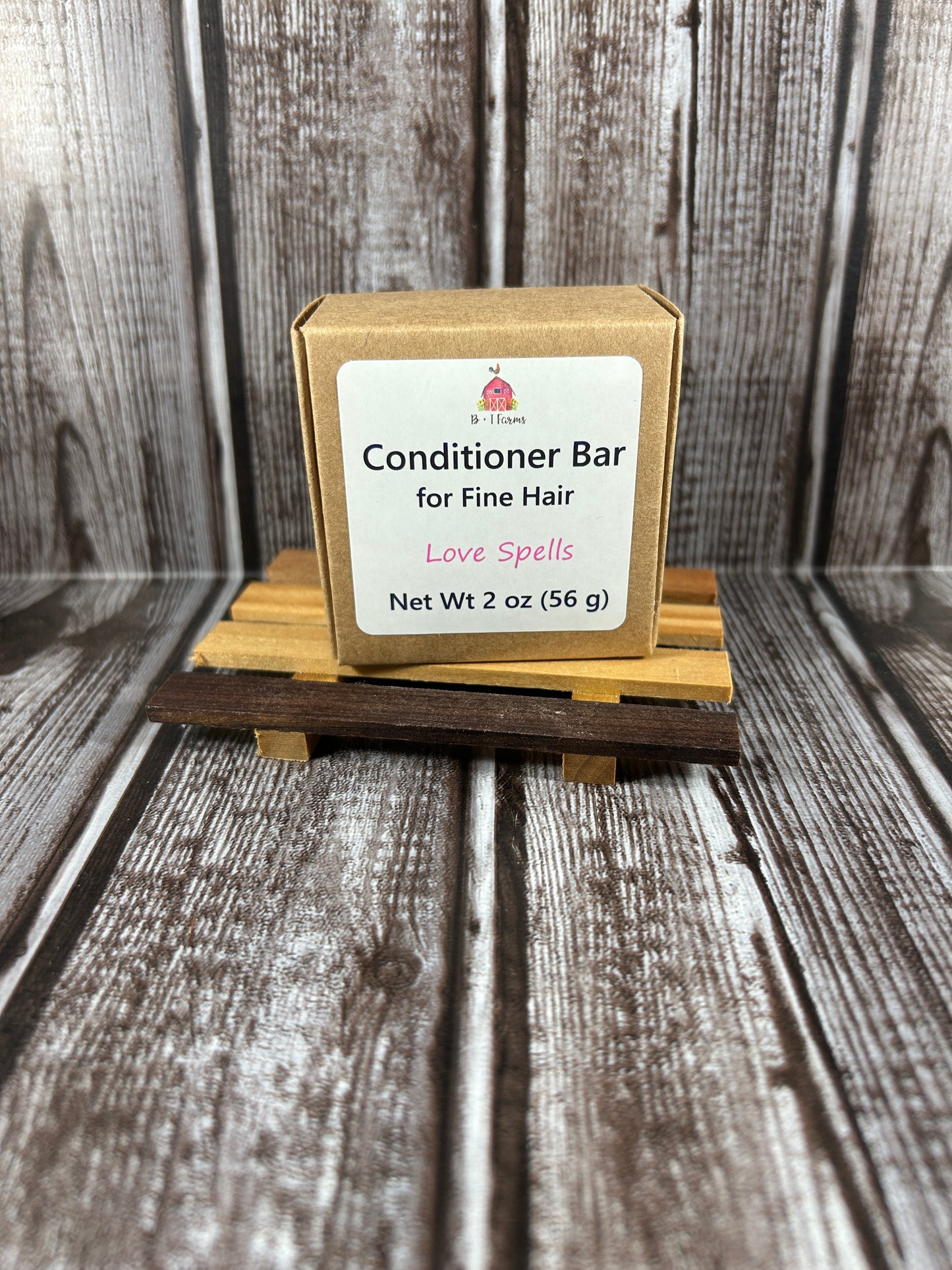 Conditioner bar packaging on a wooden background