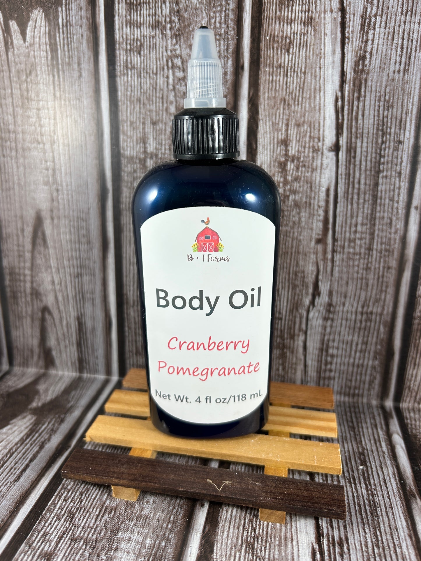 Bottle of Body Oil on a wooden surface