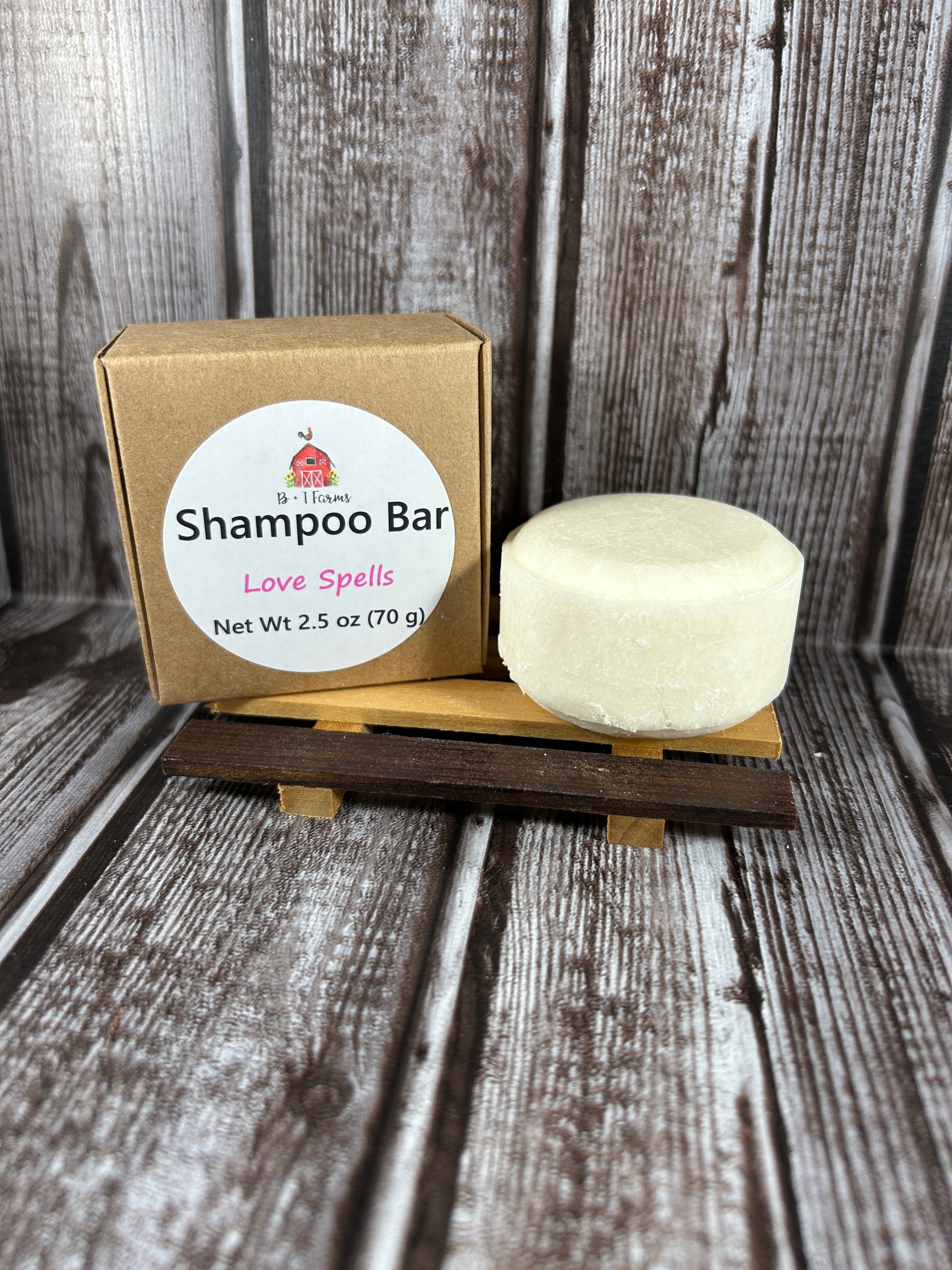 Shampoo bar on a wooden stand with a gold box labeled 'Shampoo Bar' against a rustic wooden background.
